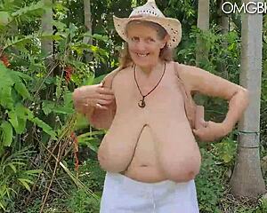 a mature babe flaunts her huge natural tits