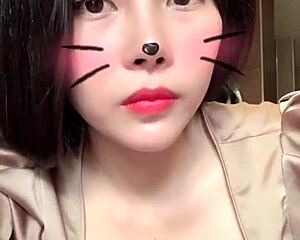 Asian Girl In White Hat Performs On Bigo Live