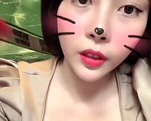 Asian Girl In White Hat Performs On Bigo Live