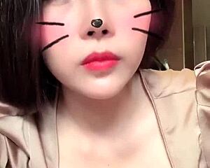 Asian Girl In White Hat Performs On Bigo Live