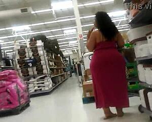 Phat booty shines in pink see-thru dress candidly