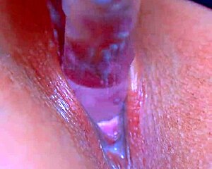 Girls Puffy Pussy Meets Glass Dildo in a Sensual Wet Exploration of Desire