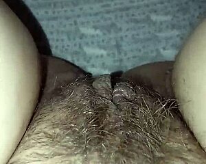 A milf with her hairy pussy open and ready