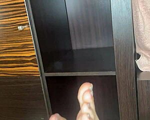 i's closeup my foot in black stockings playing with anal beads on the bed, feeling so sexy