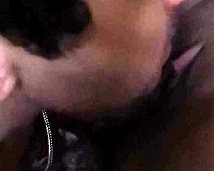 She licks the brunette's pussy