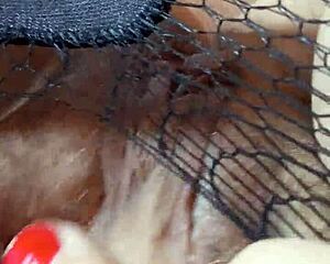 Greta, the beautiful mature lady, indulges in sensual feet fetish play with a brunette touch.