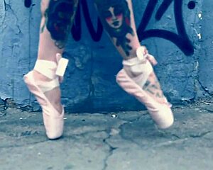Ballerina in Ballet Shoes Walking Down the Street Outdoors