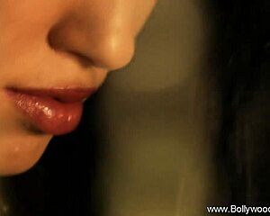 Beautiful Indian woman undresses while seducing with dance