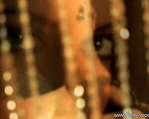 Beautiful Indian woman undresses while seducing with dance