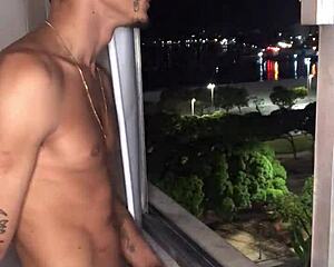 naughty boy jerks off at window