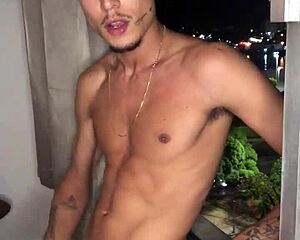 naughty boy jerks off at window