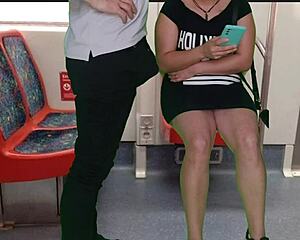 A girl in a dress without panties gave a handjob to a stranger on the train. She shocked everyone with a public blowjob.