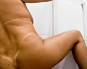 Blonde Milf Inserts Dildo Deep in Bathroom Pussy