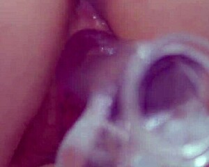 why is this busty redhead masturbating with her clear dildo?