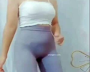 asian girl dances with subtle cameltoe tease