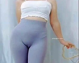 asian girl dances with subtle cameltoe tease