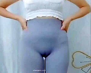 asian girl dances with subtle cameltoe tease