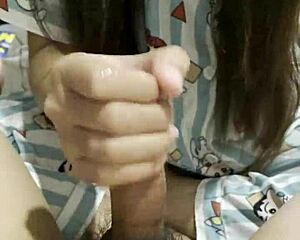 Asian Girl Gives Boyfriend Amazing Handjob in Bedroom