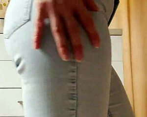 Petite Blonde Dances Seductive Striptease In Tight Jeans