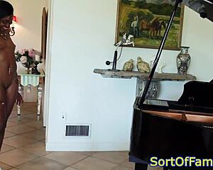 Black stepdaughter doggystyled by the piano