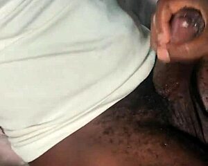 Bbc cock receives a sloppy handjob from the milf.