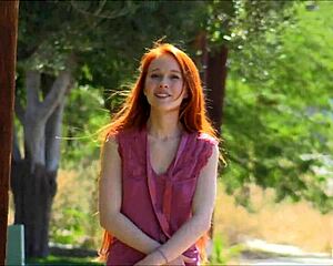 Dolly little, the 18+ redhead teen, is alone in her bedroom. She engages in self-pleasure activities with her hands.