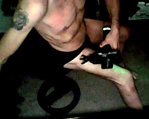 look at this percussion massager working on my thigh in underwear on a stool in briefs from june 2022