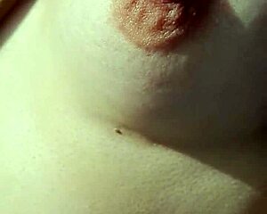 Braless Nipple Tease in Amateur Setting