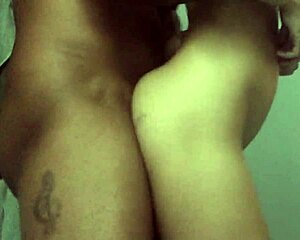 a couple enjoys intimate moments in the bedroom