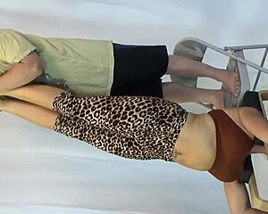 Hiring manager carefully tests the life-guard's soles during interview