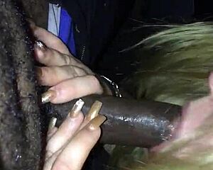 Car head with a white girl sucking big black cock