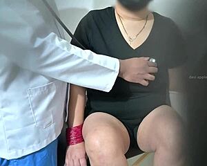 indian doctor using lady patient