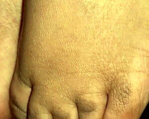 candid shots of sexy ebony feet hidden in the shadows.