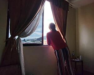 sexy blonde sucks a big cock in front of a mirror in a hotel, her cute face covered in hot cum