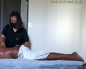 Massage girl enjoys herself during the massage on customer. The experience is calming.