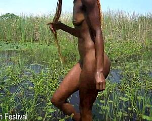 Skinny African Woman Giving A Handjob To A Tourist In A River