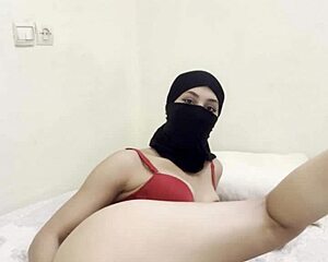 shy arab girl in hijab niqab slowly masturbates rubs juicy pussy