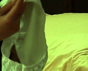 A sensual lesbian mistress in hot lingerie masturbates intensely, fingering her pussy to a powerful orgasm.