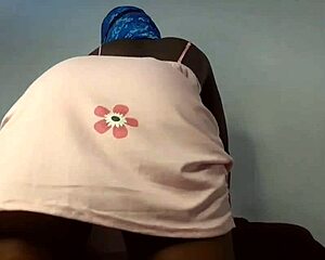 Masked babe flaunts her natural big tits and ass