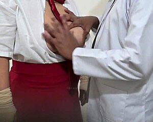 Indian doctor examines student patient in hospital setting.