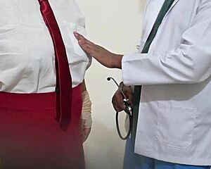 Indian doctor examines student patient in hospital setting.