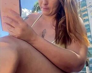 horny african flashes big swollen pussy on crowded beach