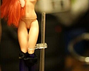 Batgirl doll gets tied up for massive cum shower drenching