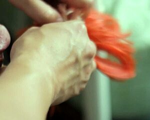 Batgirl doll gets tied up for massive cum shower drenching