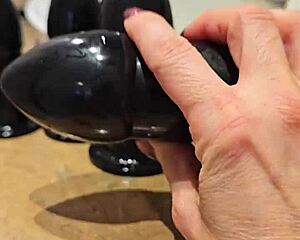 Huge Buttplug Stretches Redhead Anal