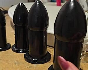 Huge Buttplug Stretches Redhead Anal