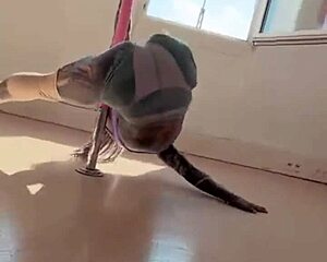 Anuskatzz sways athletic ass in exotic heels pole dance routine