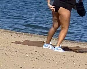 juicy asian babe teases cameltoe on candid beach hidden cam