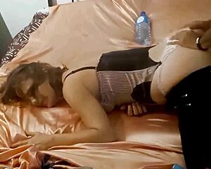 blonde amateur slips into black corset satin panties and leather for wild doggystyle pounding from behind in homemade frenzy