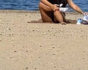 juicy asian babe teases cameltoe on candid beach hidden cam